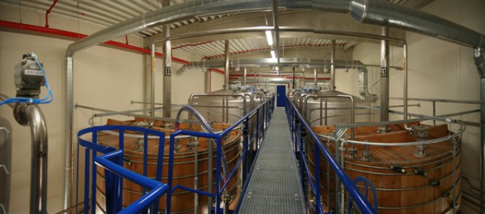 Zisk majitele Becherovky v pololetí vzrostl o devět procent